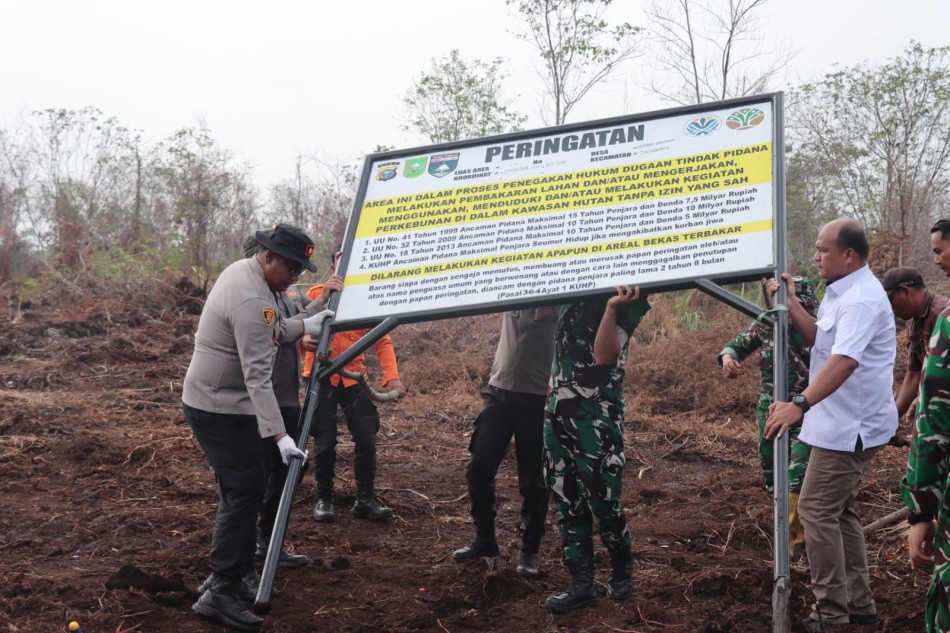 Kapolres Kampar Tegaskan Ancaman Hukum, Plang Larangan Dipasang di Lahan Bekas Karhutla